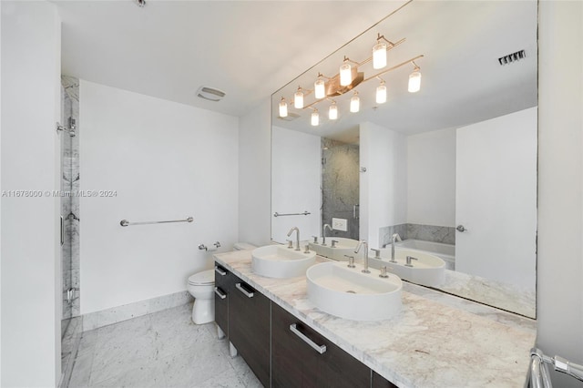 full bathroom with vanity, toilet, and independent shower and bath