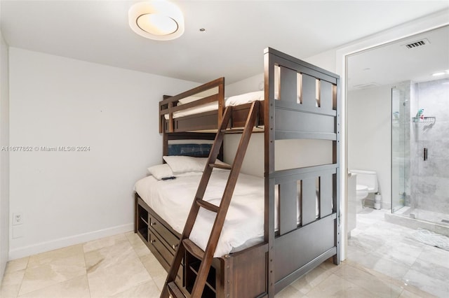 bedroom featuring ensuite bath