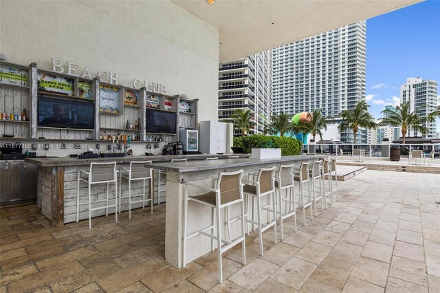 view of patio featuring a bar