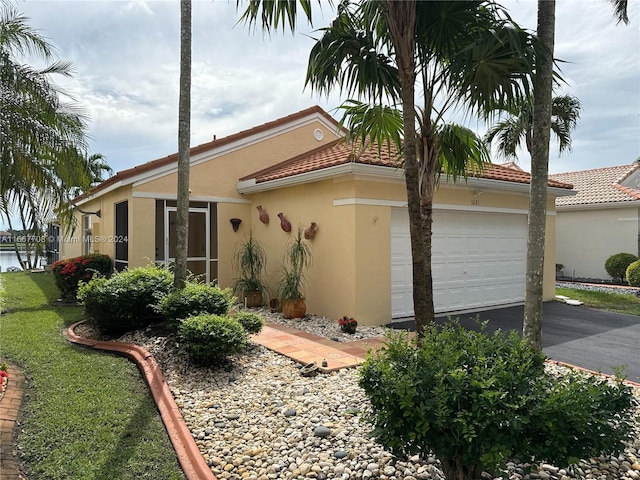 view of home's exterior with a garage