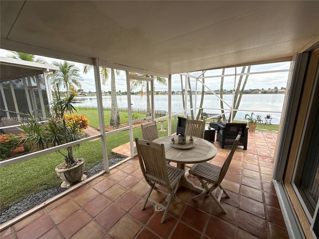 sunroom with a water view