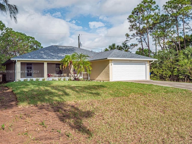 ranch-style house with a front yard and a garage