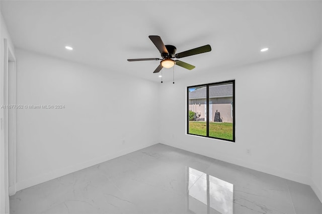 unfurnished room featuring ceiling fan