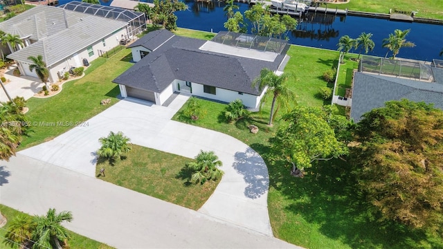 birds eye view of property featuring a water view