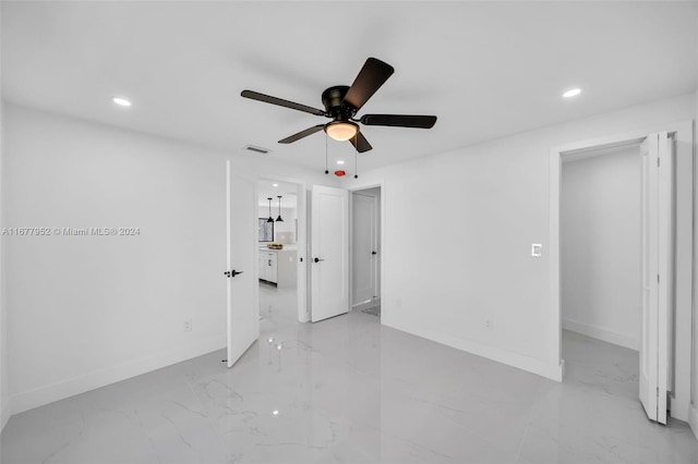 unfurnished bedroom with ceiling fan