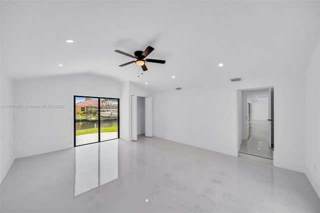 unfurnished room featuring ceiling fan and lofted ceiling