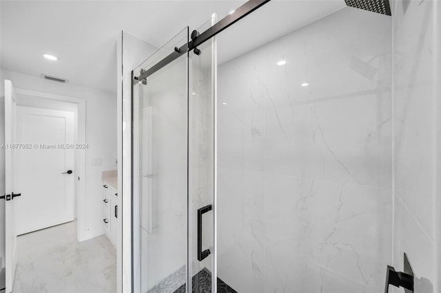 bathroom with vanity and walk in shower