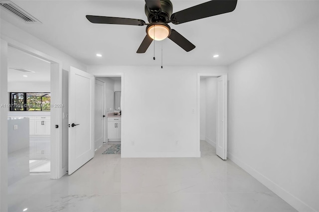 interior space featuring ceiling fan