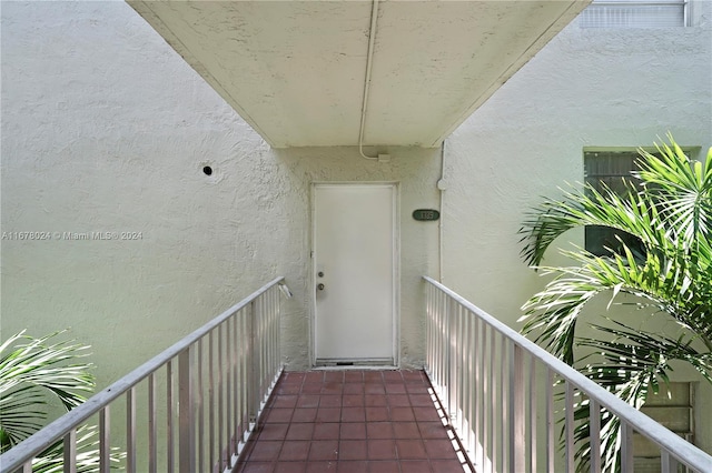 doorway to property with a balcony