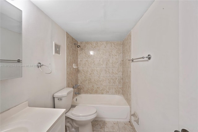 full bathroom featuring vanity, toilet, and tiled shower / bath combo