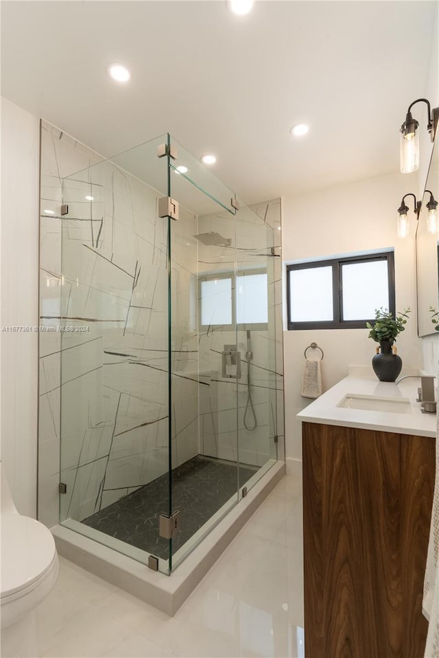 bathroom with walk in shower, tile patterned flooring, vanity, and toilet