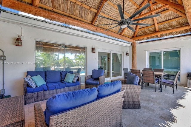 view of patio with a gazebo, an outdoor living space, and ceiling fan