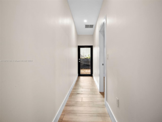 corridor featuring light wood-type flooring