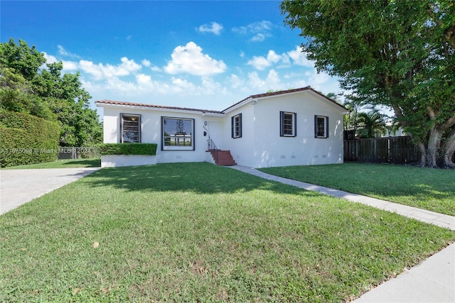 view of front of property with a front lawn