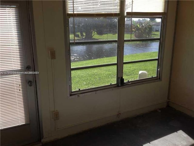 entryway with a water view