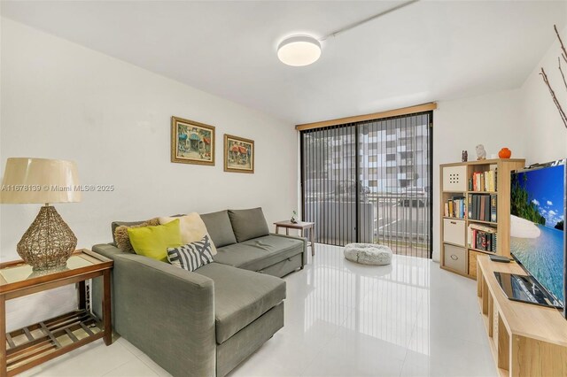 living room with light tile patterned floors