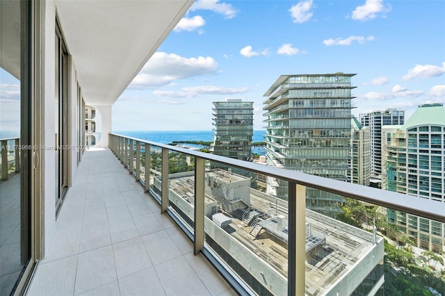 balcony with a city view and a water view