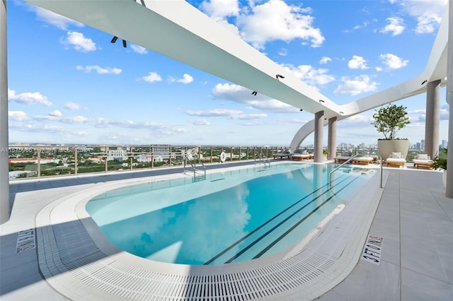 view of pool featuring a patio