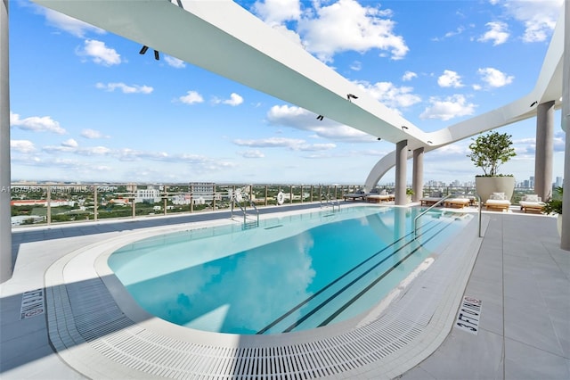 community pool featuring a view of city