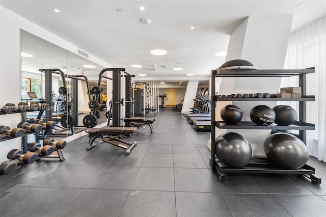 workout area with visible vents and recessed lighting