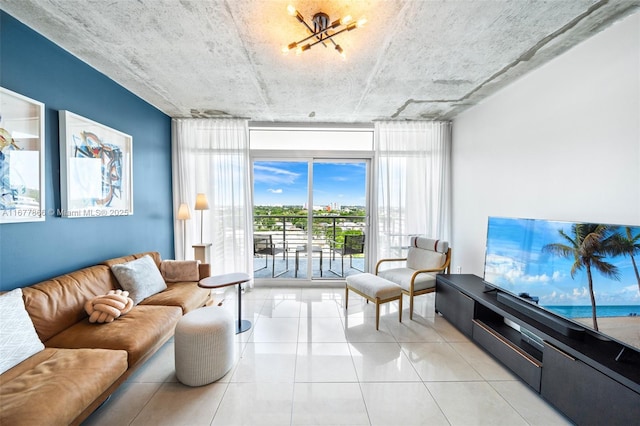 tiled living room featuring expansive windows