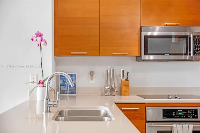 kitchen with sink and stainless steel appliances