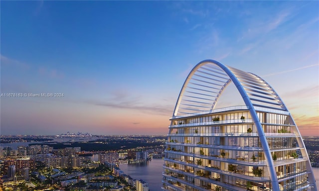 outdoor building at dusk with a water view