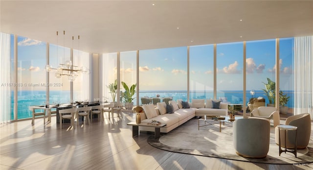 sunroom / solarium with a water view