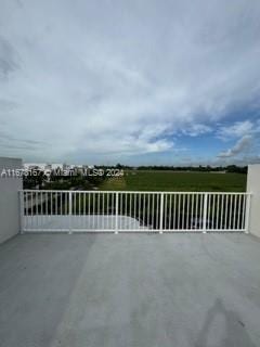 view of patio / terrace with a balcony