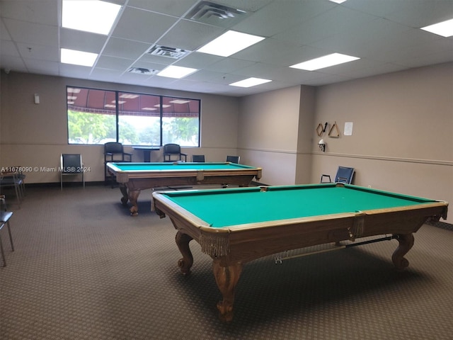 recreation room with carpet, a paneled ceiling, and billiards