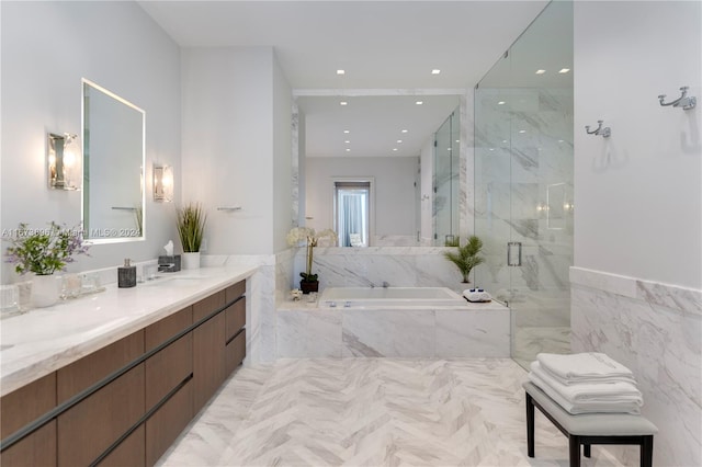 bathroom featuring vanity and plus walk in shower