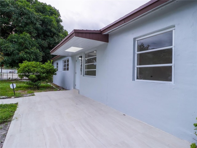 view of home's exterior featuring a patio area