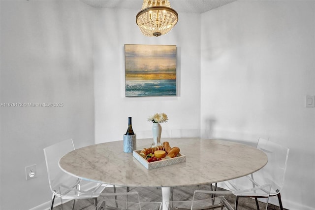 dining area with a chandelier