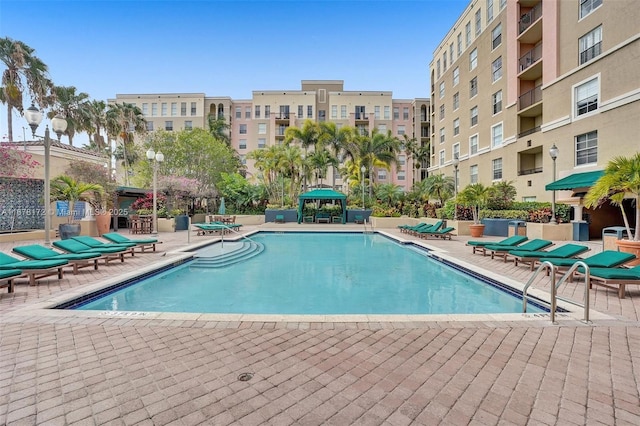 view of swimming pool featuring a patio area