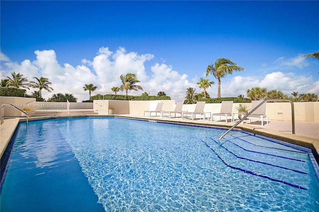 view of pool featuring a patio area