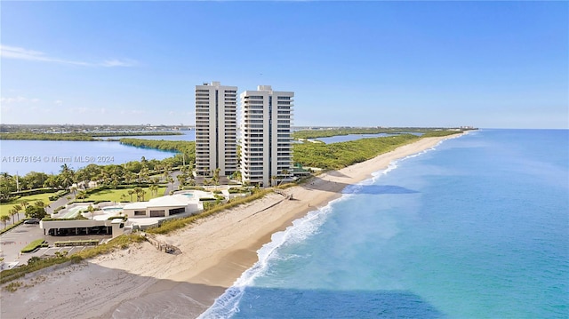 drone / aerial view with a view of the beach and a water view