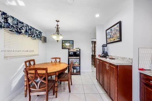 view of tiled dining space