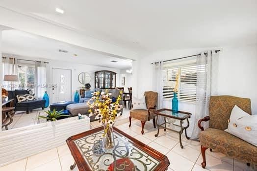 living room with tile patterned floors