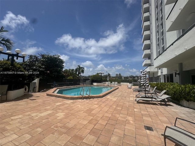 view of pool with a patio