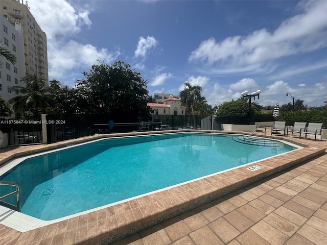 view of pool with a patio