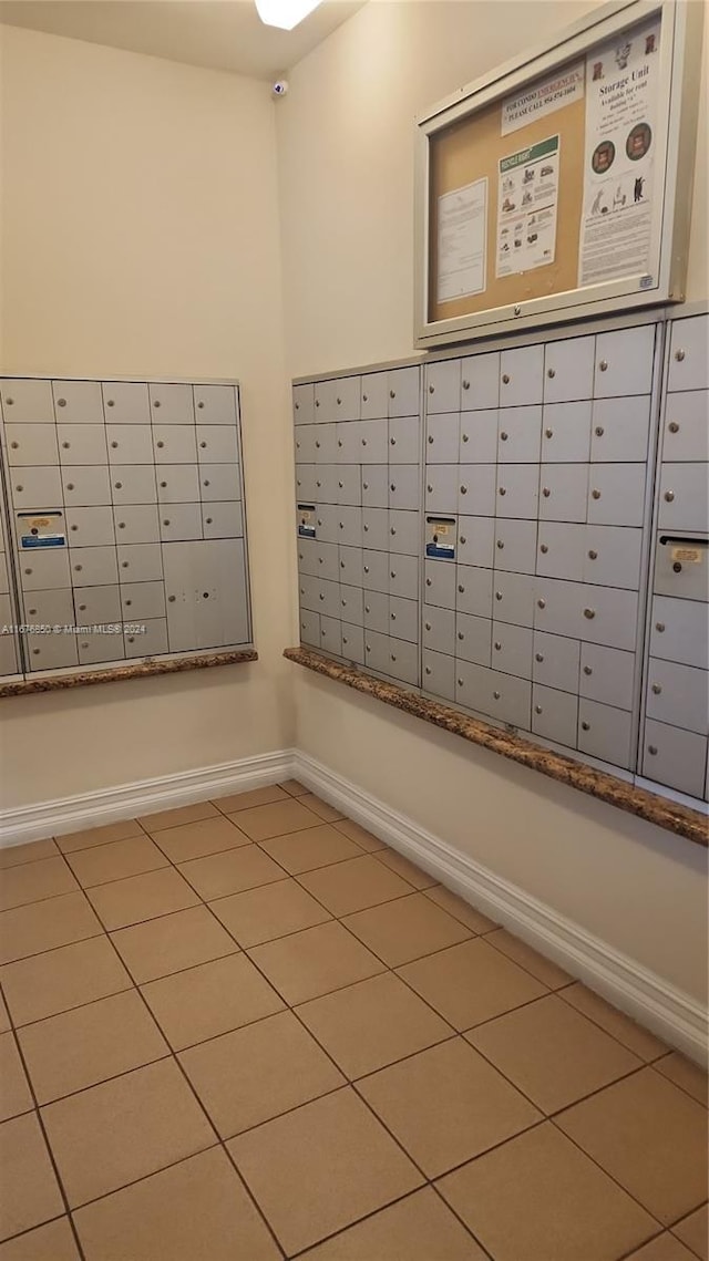 view of home's community featuring mail area