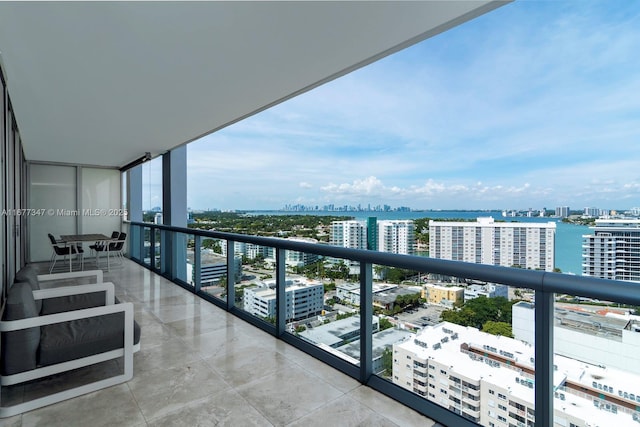 balcony featuring a water view