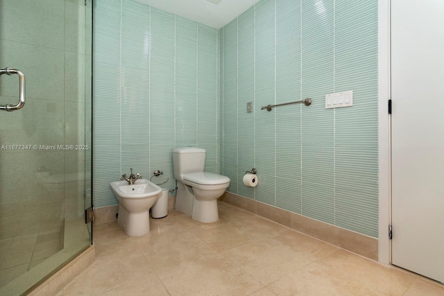 bathroom featuring a bidet, tile walls, walk in shower, tile patterned flooring, and toilet