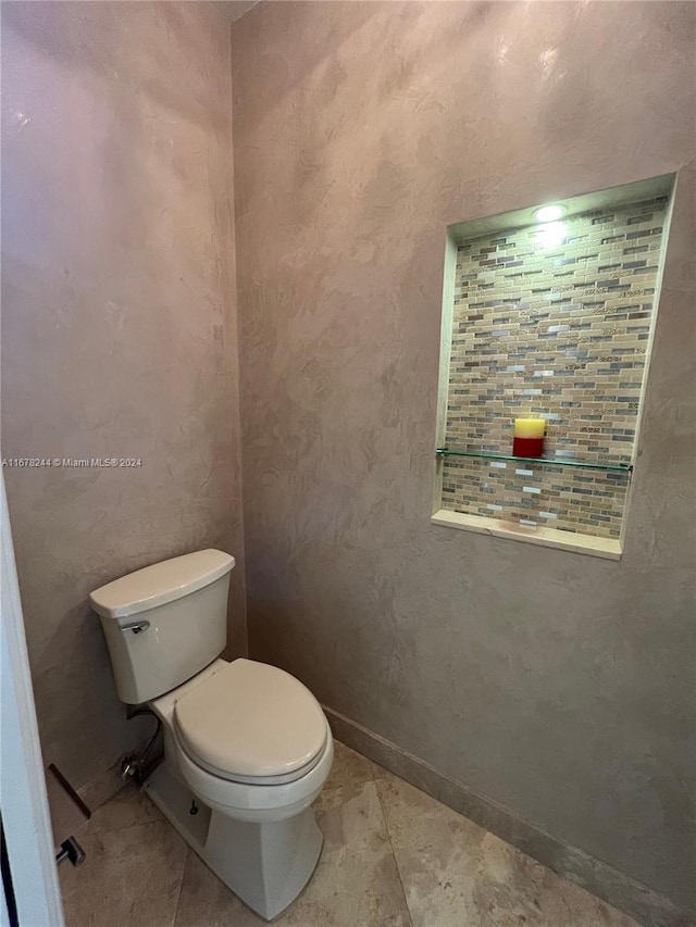 bathroom featuring toilet