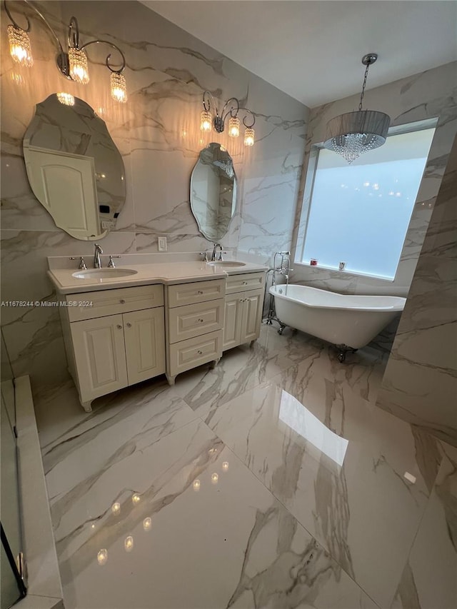 bathroom featuring vanity, a tub, and tile walls