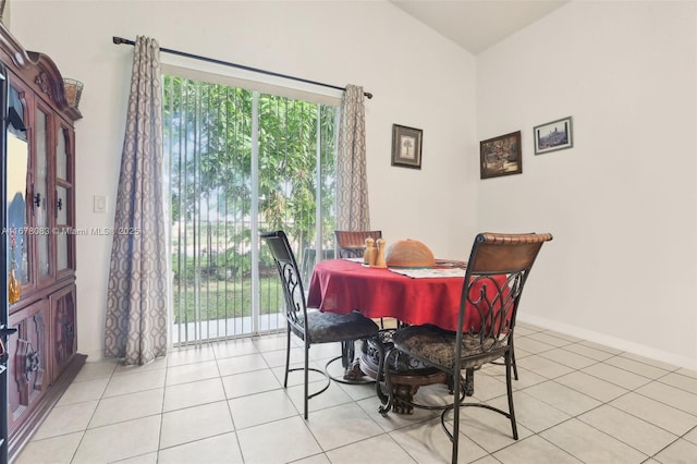 dining space with light tile patterned floors