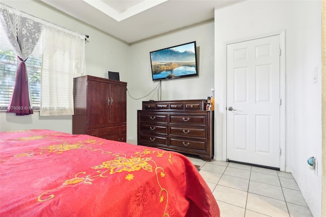 bedroom featuring light tile patterned floors