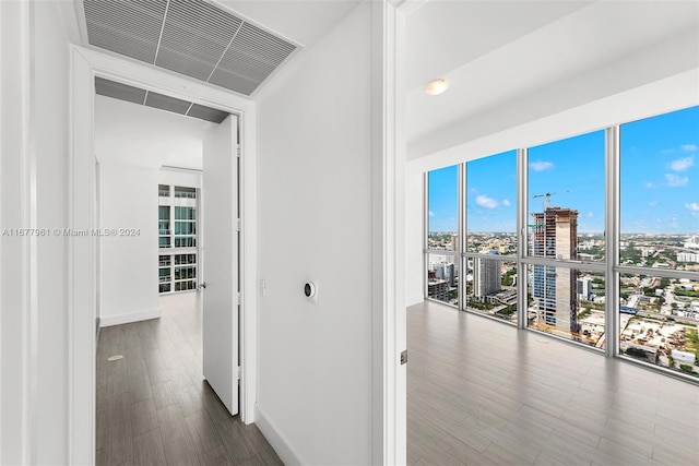 hallway featuring hardwood / wood-style floors