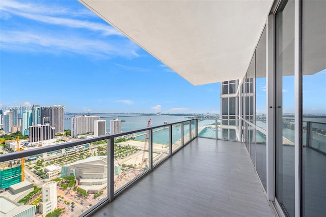 balcony featuring a water view