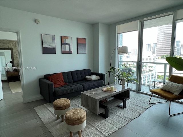 living room with light tile patterned floors and a wealth of natural light